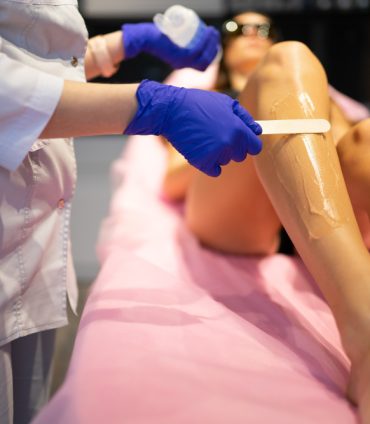 Leg waxing treatment at Casa Nuda Wax in Dallas, smoother alternative to shaving